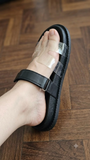 Sandales à plateforme noires avec bride transparente – Style "H"